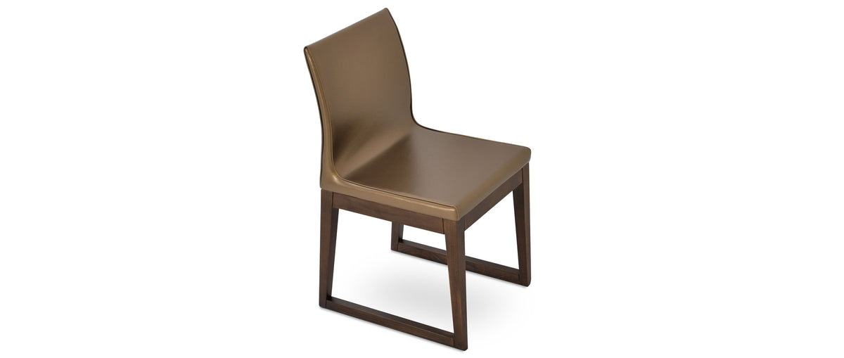 Polo Sled Wood Chair by SohoConcept, showing top view of polo sled wood chair in gold ppm with walnut wood base.