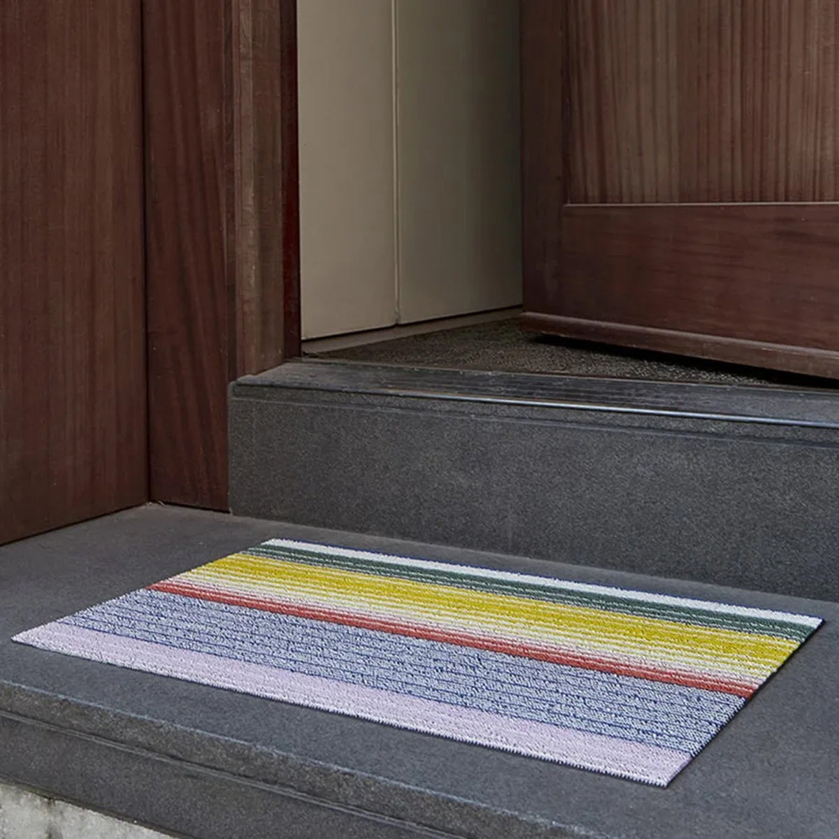 Pop Stripe Shag Mat by Chilewich, showing pop stripe shag mat in live shot.