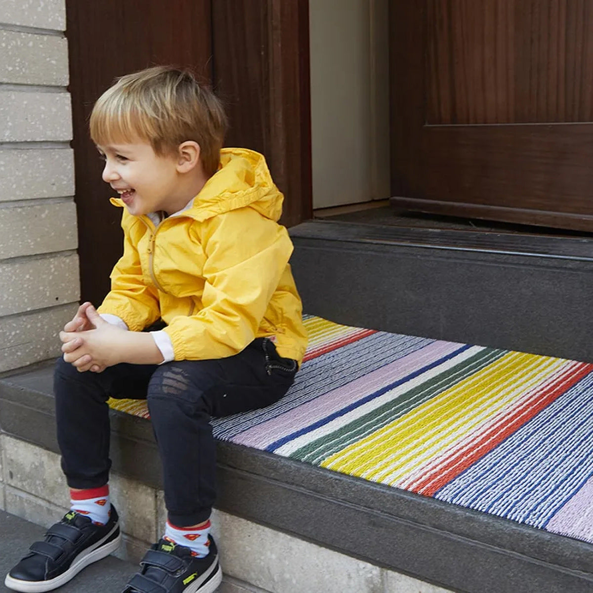 Pop Stripe Shag Mat by Chilewich, showing pop stripe shag mat in live shot.