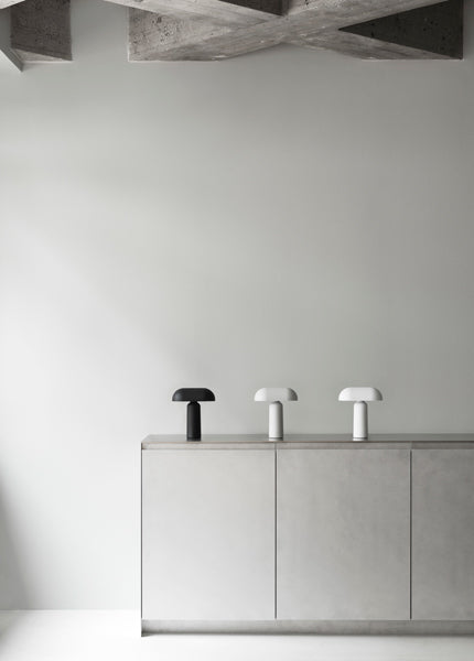 Porta Table Lamp by Normann Copenhagen, showing porta table lamps in live shot.