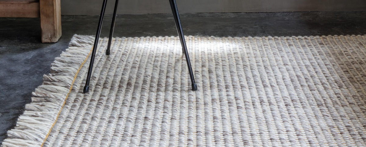 Primal 231.001.700 Hand Woven Rug by Ligne Pure, showing closeup view of primal hand woven rug in live shot.