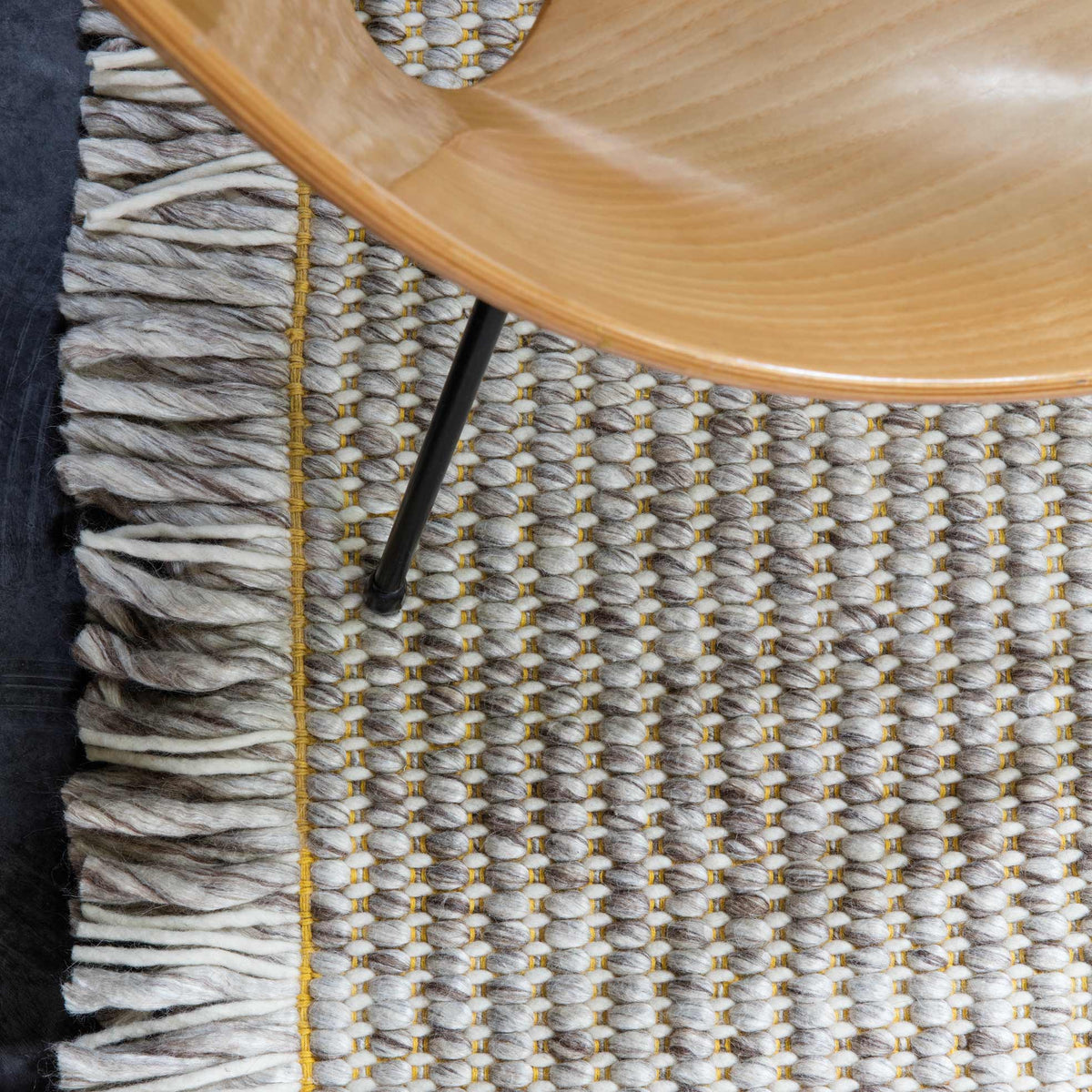 Primal 231.001.700 Hand Woven Rug by Ligne Pure, showing closeup view of primal hand woven rug in live shot.