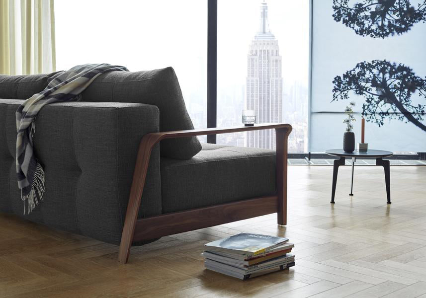 Ran D.E.L Sofa Bed by Innovation, showing ran d.e.l sofa bed with table in live shot.