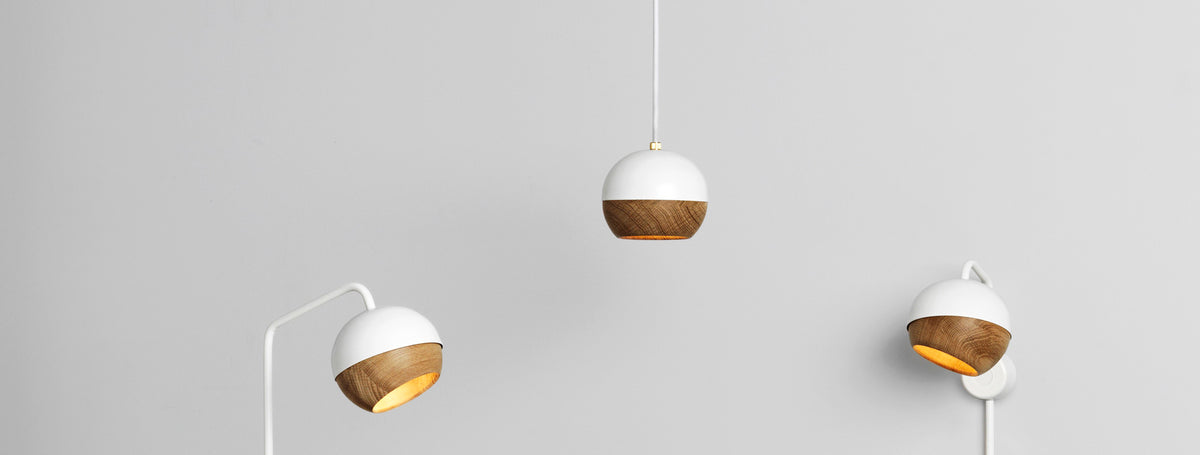 Ray Pendant Lamp by Mater, showing ray pendant lamp with table lamps in live shot.
