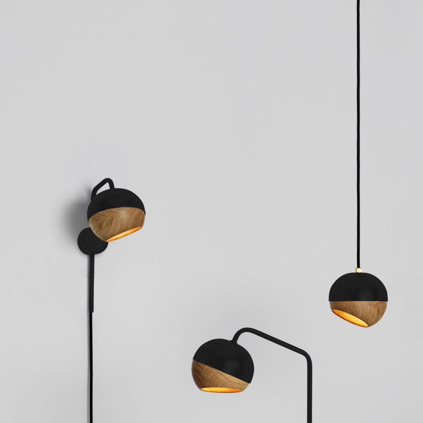Ray Pendant Lamp by Mater, showing ray pendant lamp with table lamps in live shot.