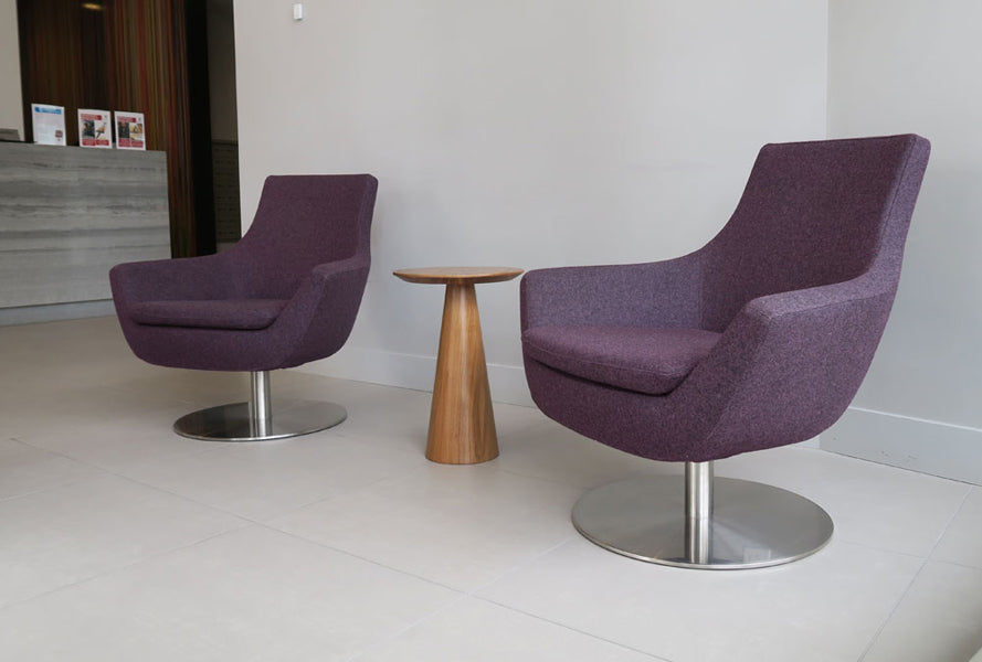 Rebecca Swivel Round Arm Chair by SohoConcept, showing swivel round arm chairs with table in live shot.