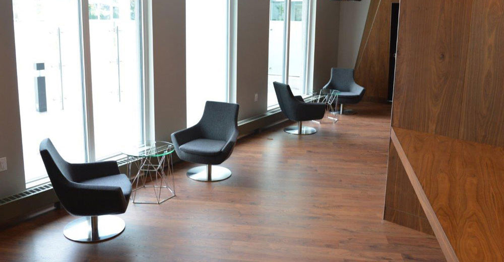 Rebecca Swivel Round Arm Chair by SohoConcept, showing swivel round arm chairs with table in live shot.