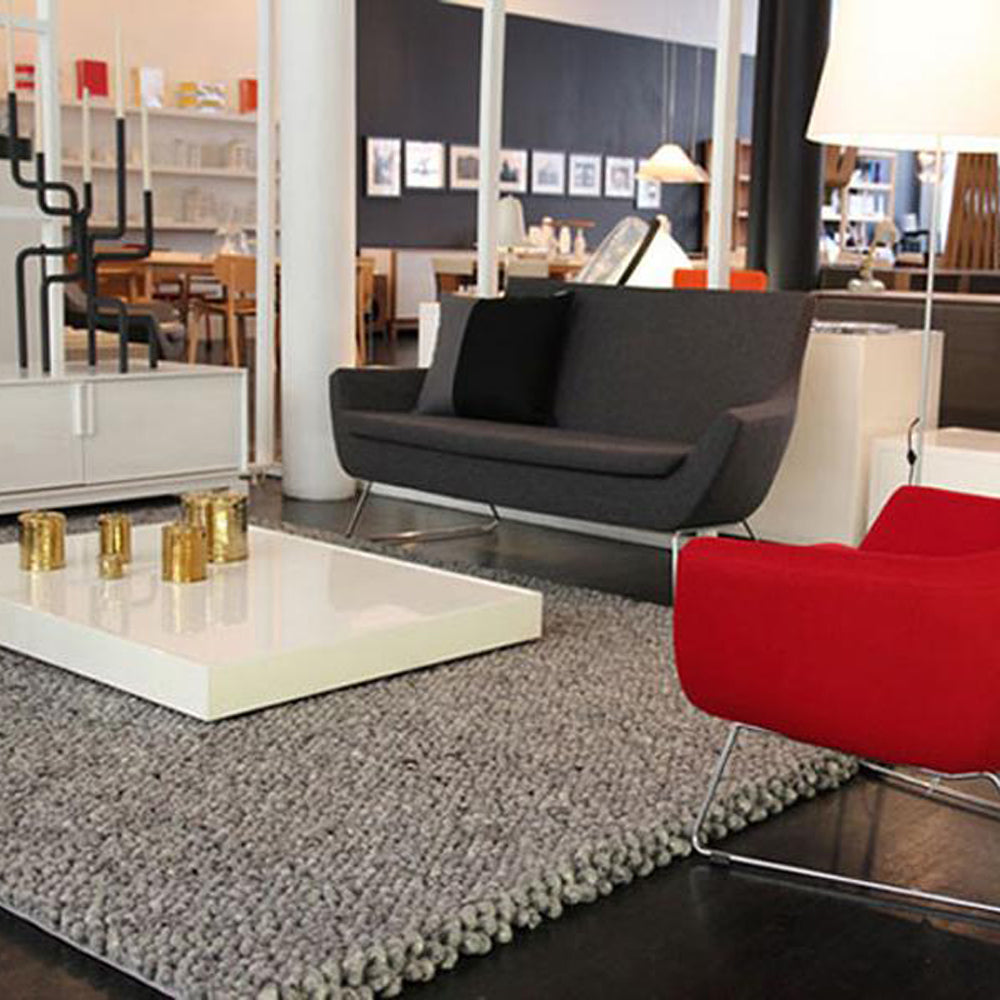 Rebecca Two Seater Sofa by sohoConcept, showing angle view of two seater wire sled base sofa in live shot.
