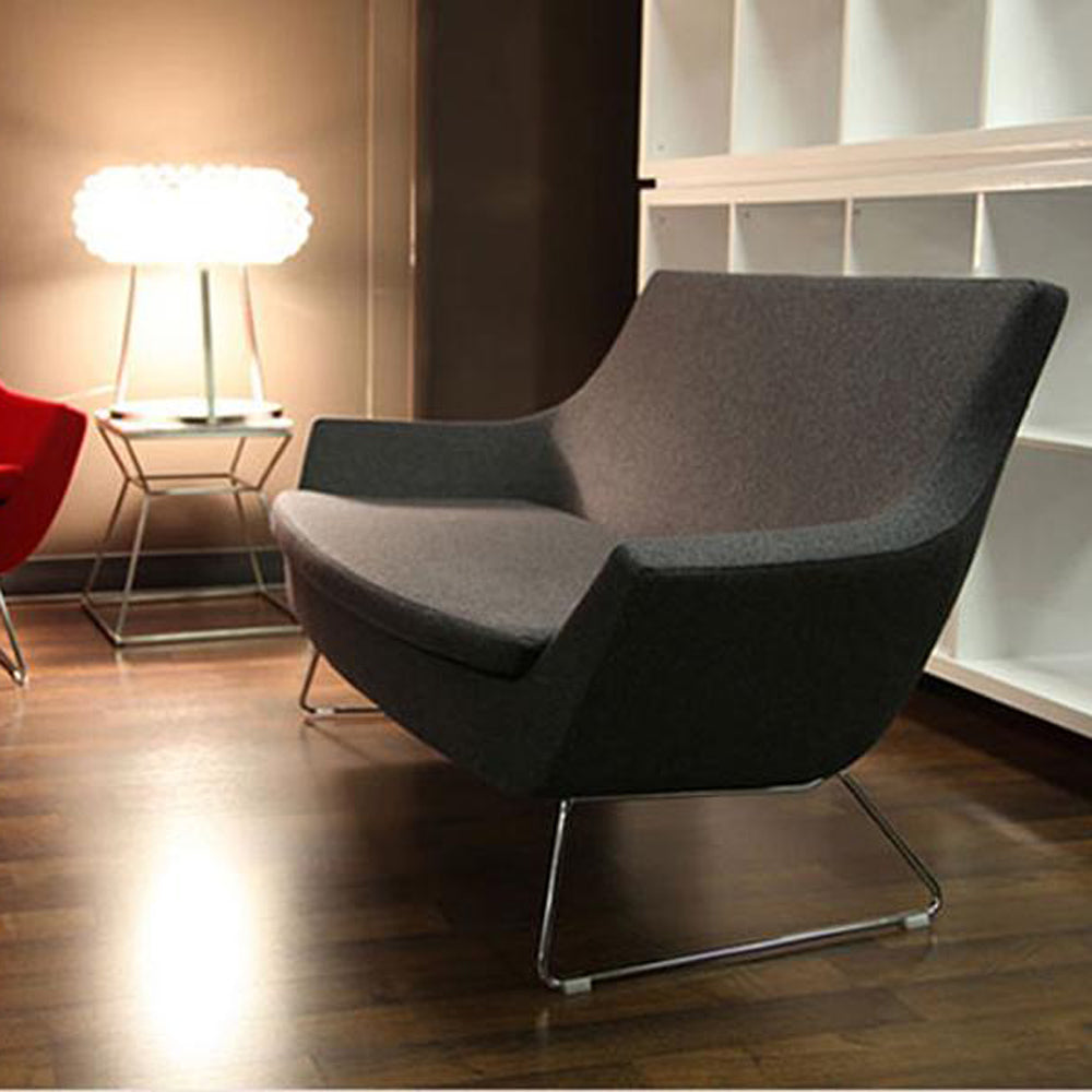 Rebecca Two Seater Sofa by sohoConcept, showing side view of two seater wire sled base sofa in live shot.