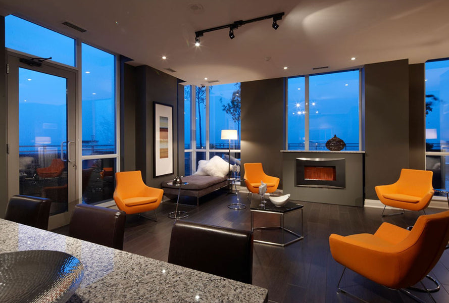 Rebecca Wire Sled Arm Chair by SohoConcept, showing four wire sled arm chair with table in live shot.