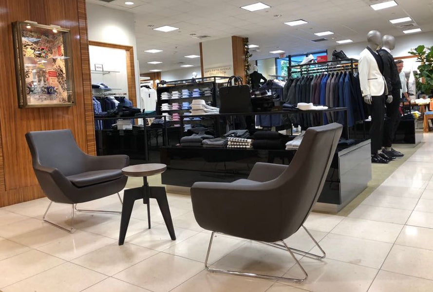 Rebecca Wire Sled Arm Chair by SohoConcept, showing two wire sled arm chair with table in live shot.