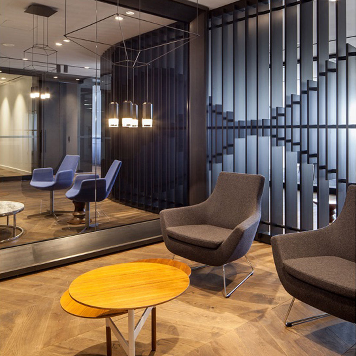 Rebecca Wire Sled Arm Chair by SohoConcept, showing two wire sled arm chair with table in live shot.