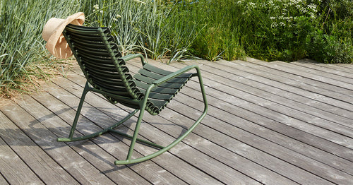 Reclips Outdoor Rocking Chair by Houe, showing reclips outdoor rocking chair in live shot.