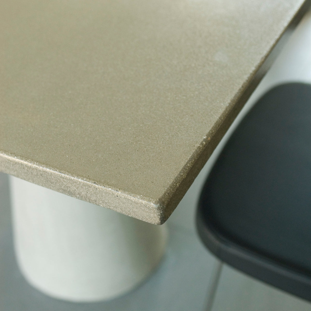 James De Wulf Rectangular Locking Dining Table by De Wulf, showing closeup view of rectangular locking dining table in live shot.