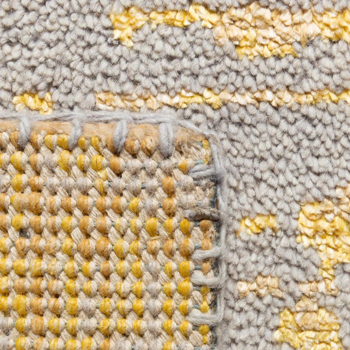 Reflect Hand Knotted Rug by Ligne Pure, showing closeup view of reflect hand knotted rug.