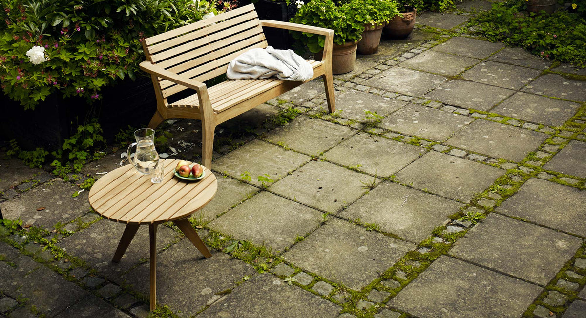Regatta Lounge Bench by Skagerak, showing regatta lounge bench with lounge table in live shot.
