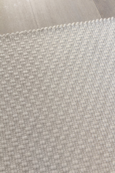 Rhythm Hand Woven Rug by Ligne Pure, showing closeup view of rhythm hand woven rug.