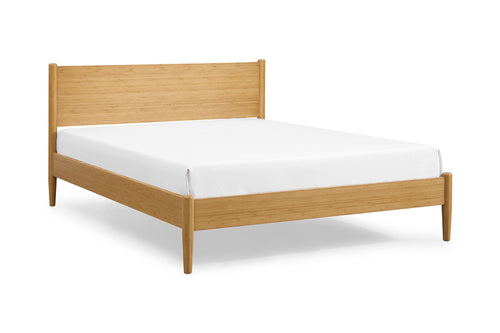 Ria Caramelized Platform Bed by Greenington, showing angle view of ria caramelized platform bed in caramelized wood with mattress.