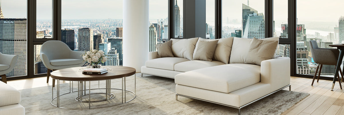 Ripples Coffee Table by SohoConcept, showing coffee table with sofa and chair.