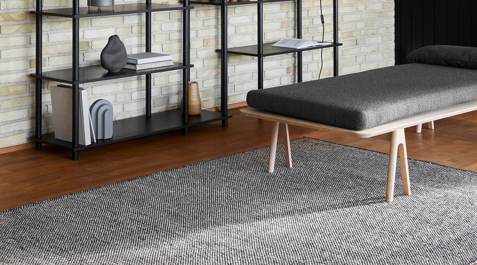 Rombo Rug by Woud, showing closeup view of rombo rug in live shot.