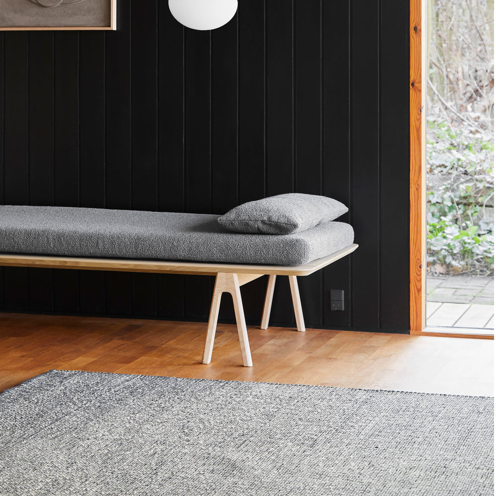Rombo Rug by Woud, showing closeup view of rombo rug in live shot.