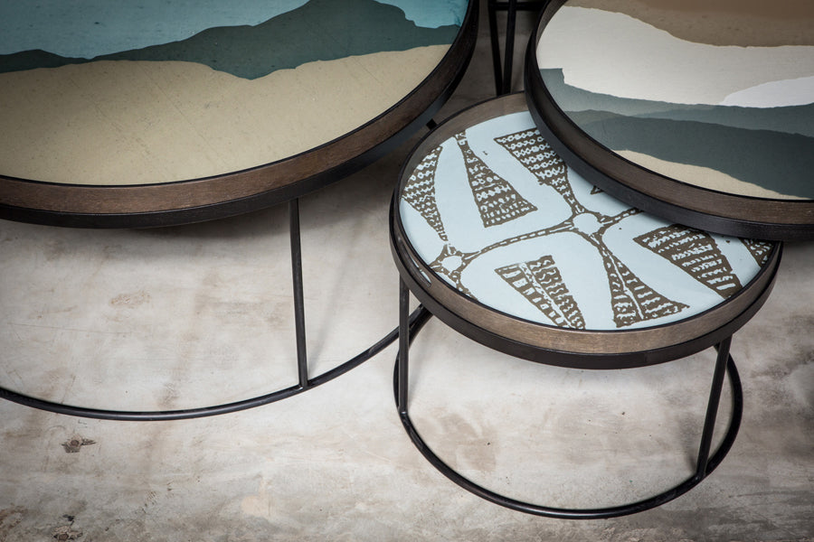 Tray Coffee Table by Ethnicraft, showing closeup view of tray coffee tables set in live shot.