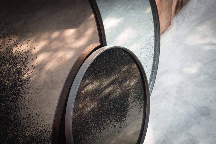 Aged Wall Mirror by Ethnicraft, showing side view of wall mirrors in live shot.