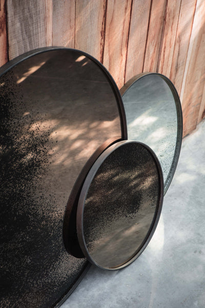 Aged Wall Mirror by Ethnicraft, showing side view of wall mirrors in live shot.