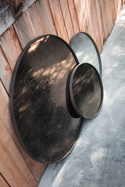 Aged Wall Mirror by Ethnicraft, showing side view of wall mirrors in live shot.