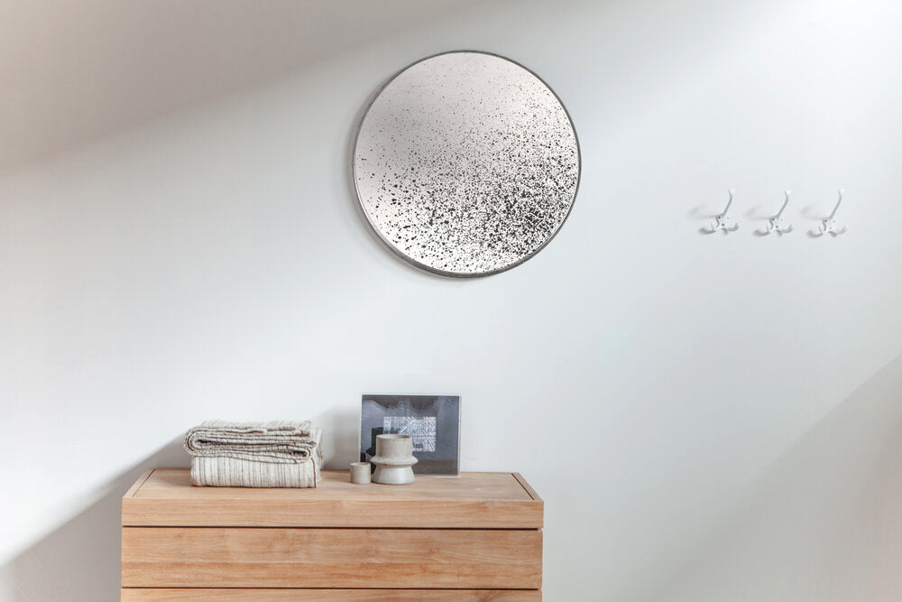 Aged Wall Mirror by Ethnicraft, showing front view of clear wall mirror in live shot.