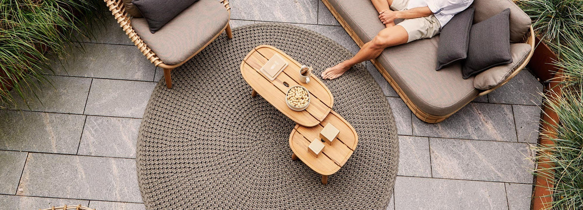 Royal Coffee Table by Cane-Line, showing royal coffee tables in live shot.