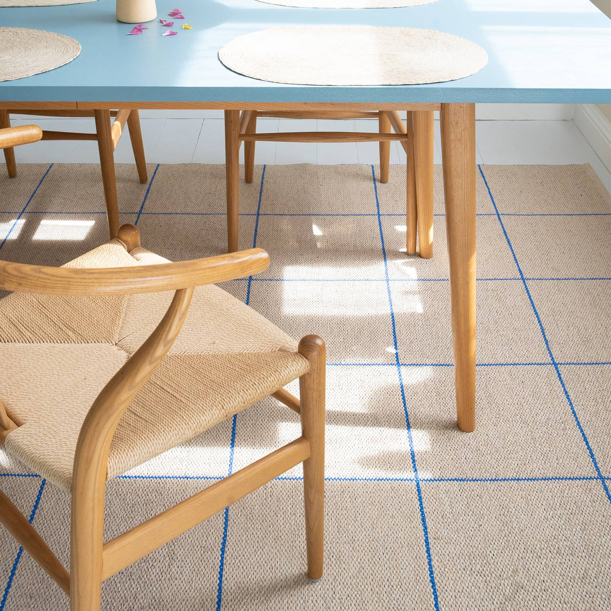 Ruth Woven Plastic Rug by Brita, showing closeup view of ruth woven plastic rug in live shot.