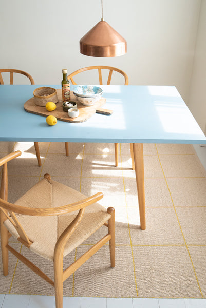 Ruth Woven Plastic Rug by Brita, showing closeup view of ruth woven plastic rug in live shot.