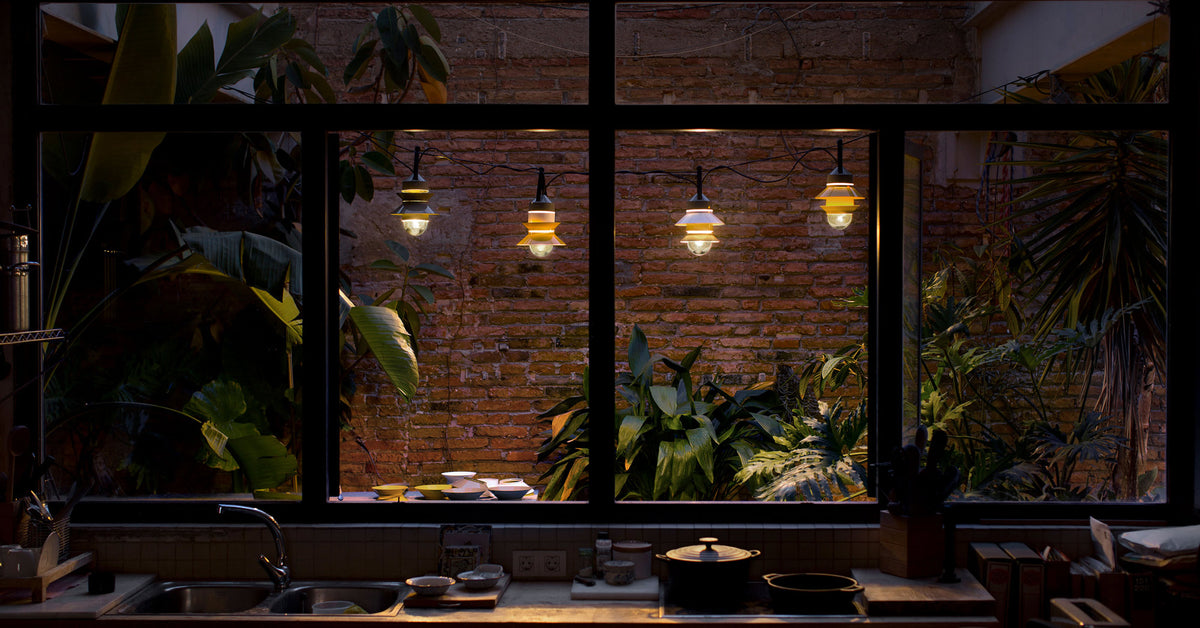Santorini Outdoor Pendant by Marset, showing santorini outdoor pendants in live shot.