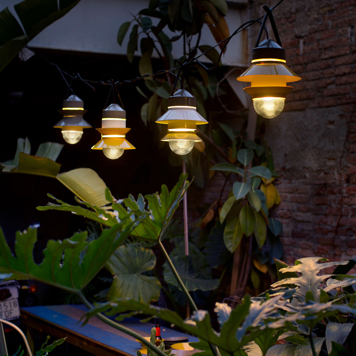 Santorini Outdoor Pendant by Marset, showing santorini outdoor pendants in live shot.
