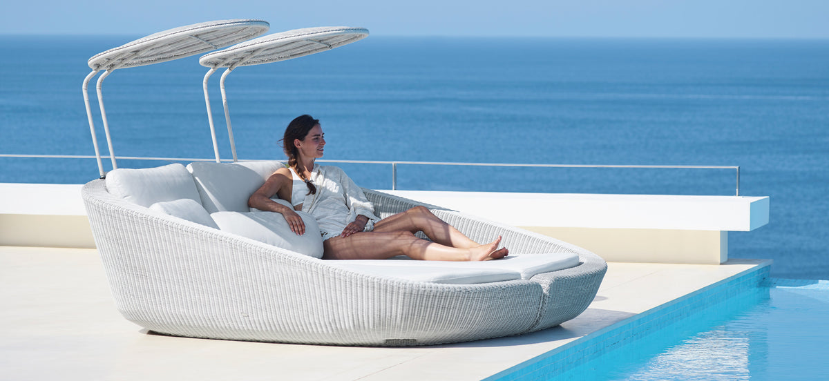 Savannah Daybed Left Module by Cane-Line, showing savannah daybed left module with right module in live shot.