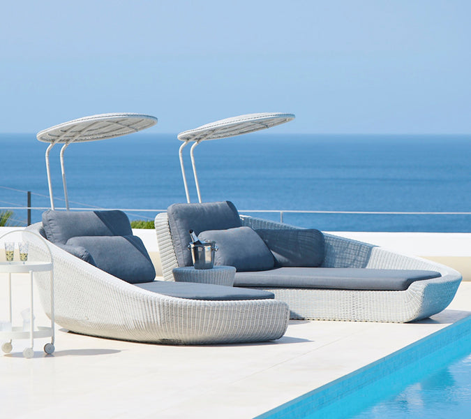 Savannah Daybed Left Module by Cane-Line, showing savannah daybed left module with right module in live shot.