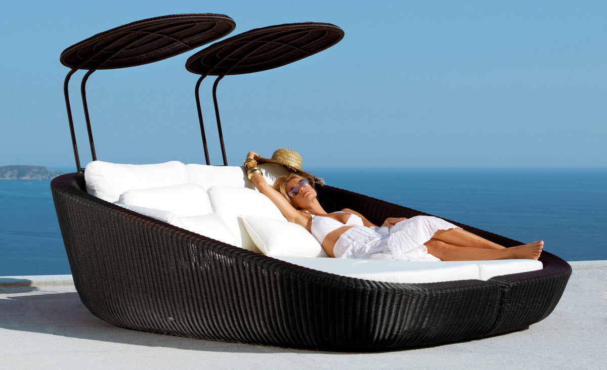Savannah Daybed Right Module by Cane-Line, showing savannah daybed right module with left module in in live shot.