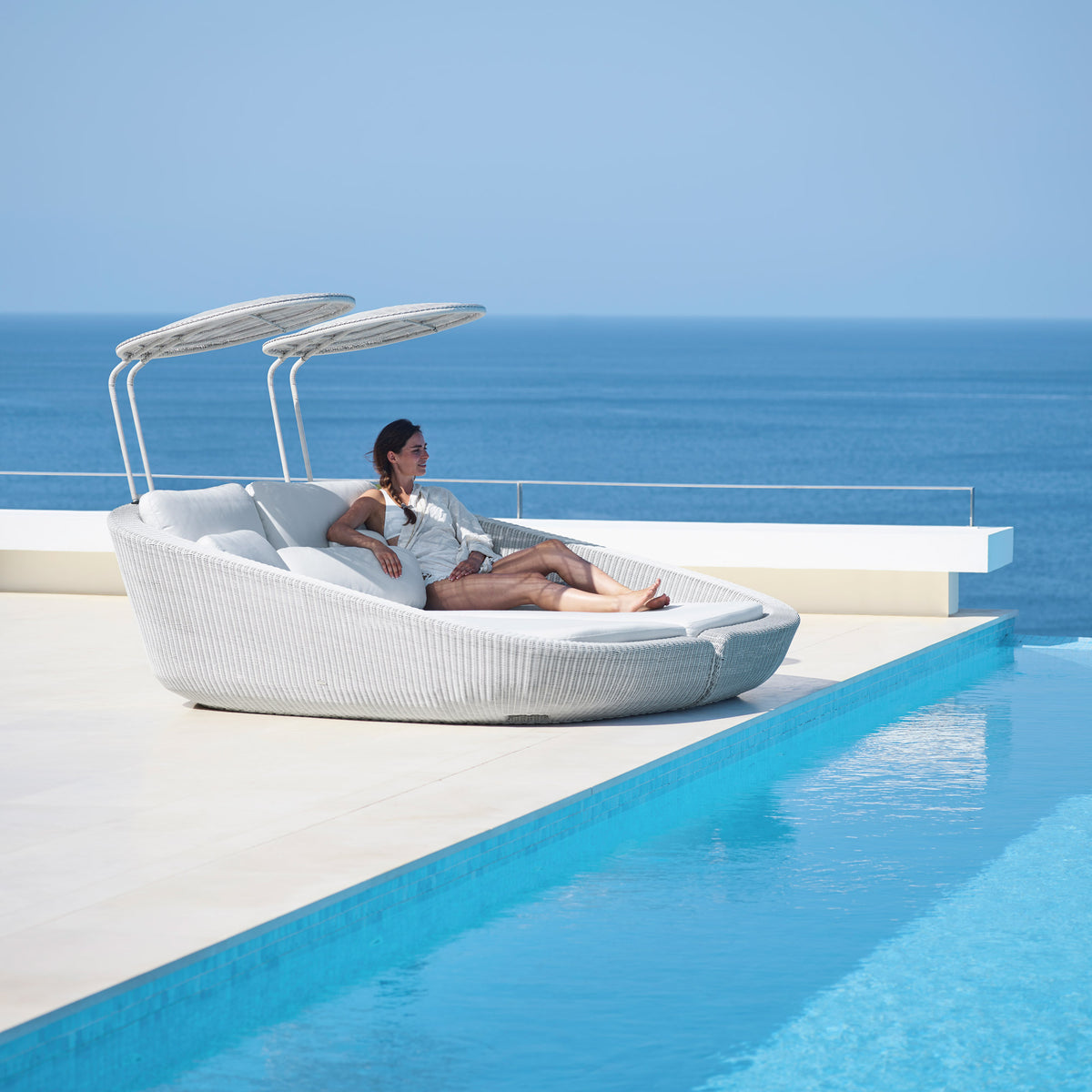 Savannah Daybed Right Module by Cane-Line, showing savannah daybed right module with left module in in live shot.