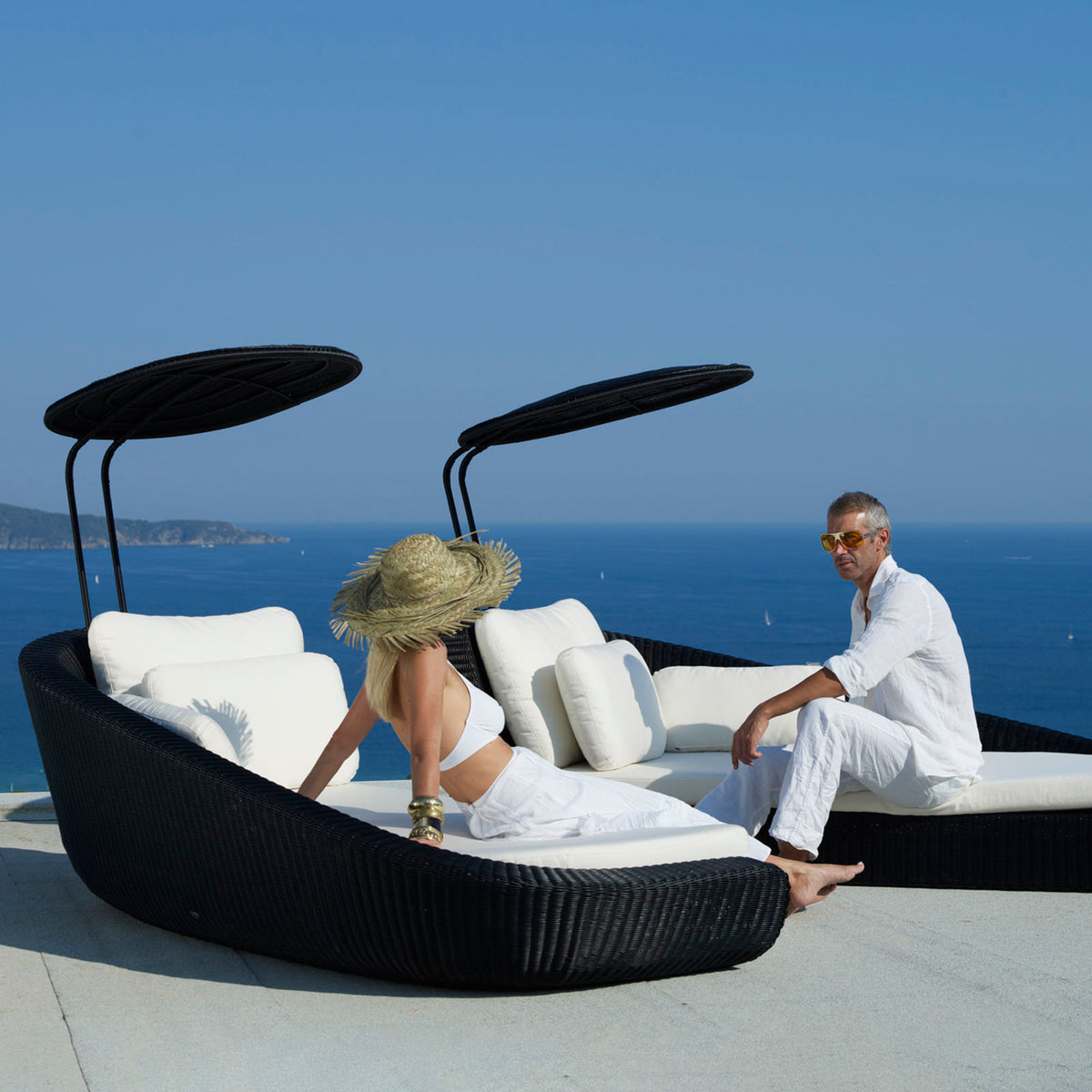 Savannah Daybed Right Module by Cane-Line, showing savannah daybed right module with left module in in live shot.