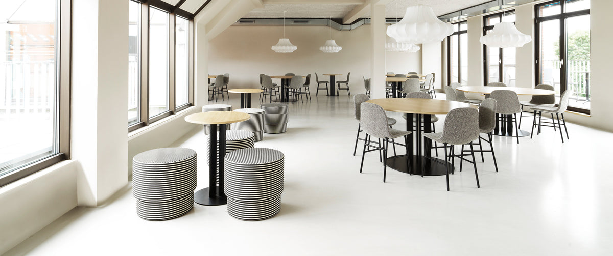 Scala Cafe Table by Normann Copenhagen, showing scala cafe tables in live shot.