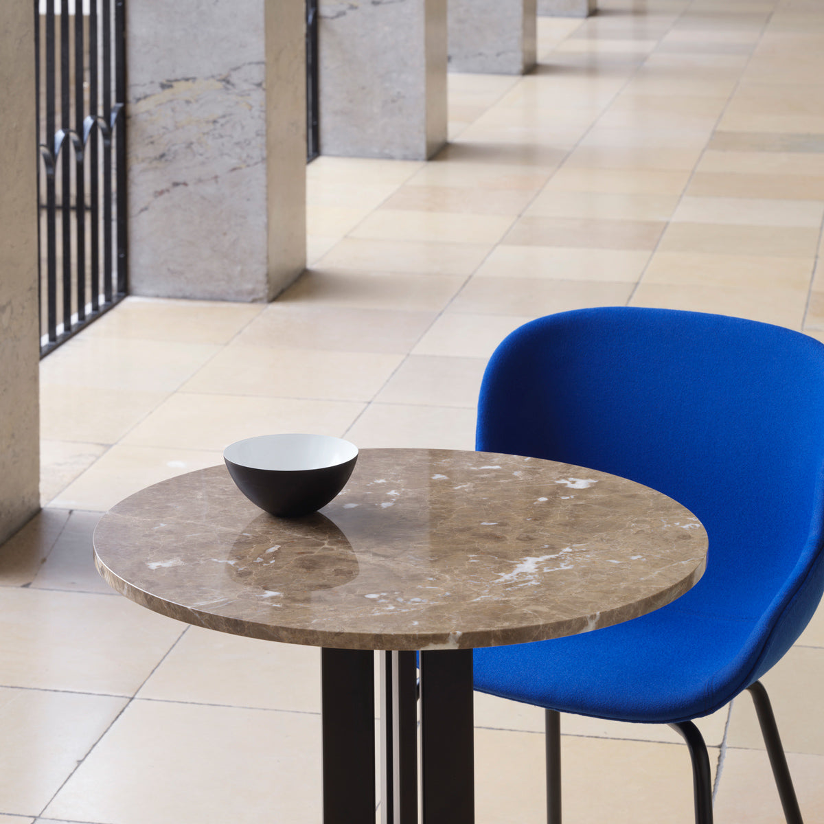 Scala Cafe Table by Normann Copenhagen, showing closeup view of scala cafe table in live shot.