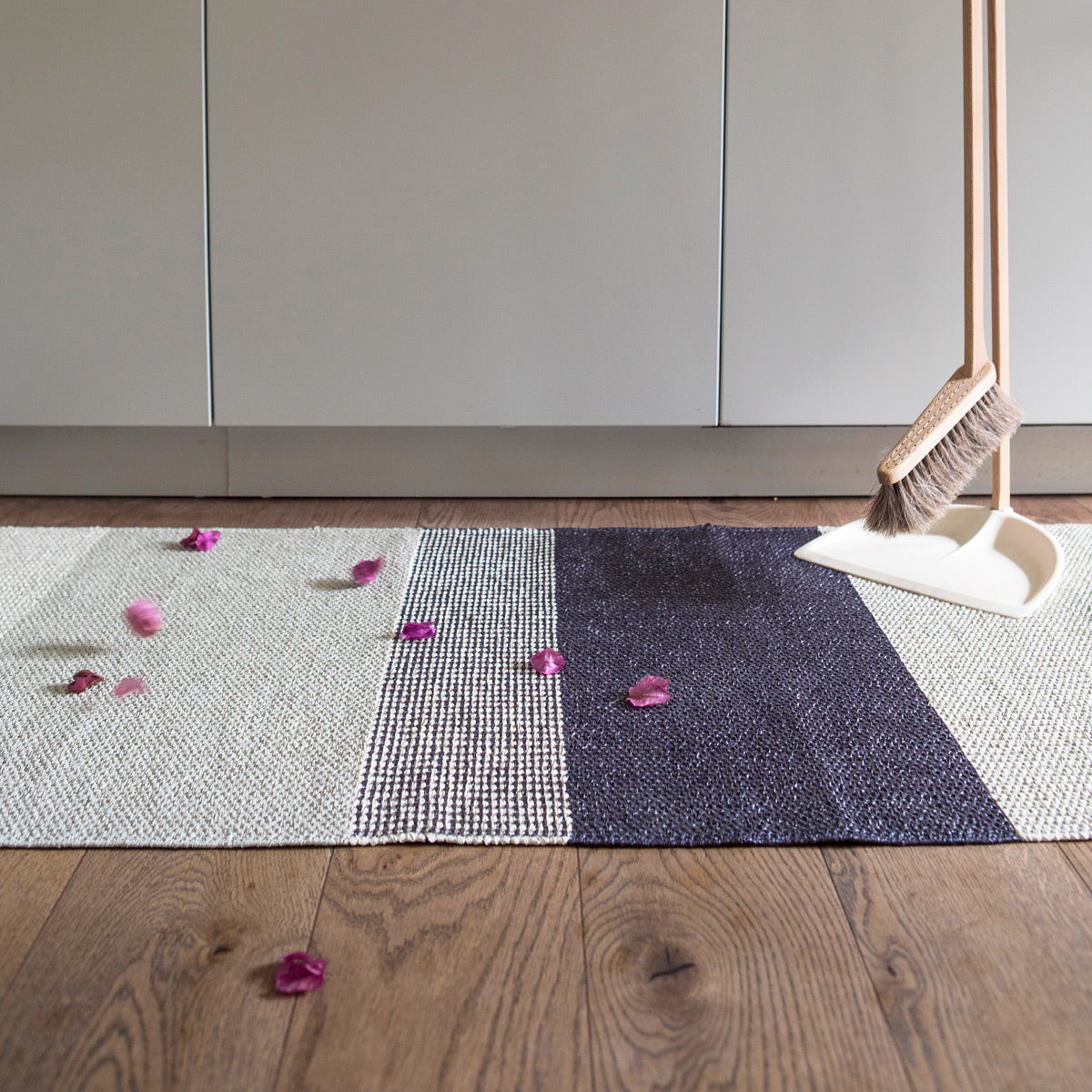 Seasons Woven Plastic Rug by Brita, showing closeup view of seasons woven plastic rug in live shot.