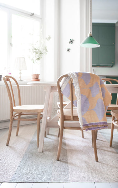 Seasons Woven Plastic Rug by Brita, showing closeup view of seasons woven plastic rug in live shot.