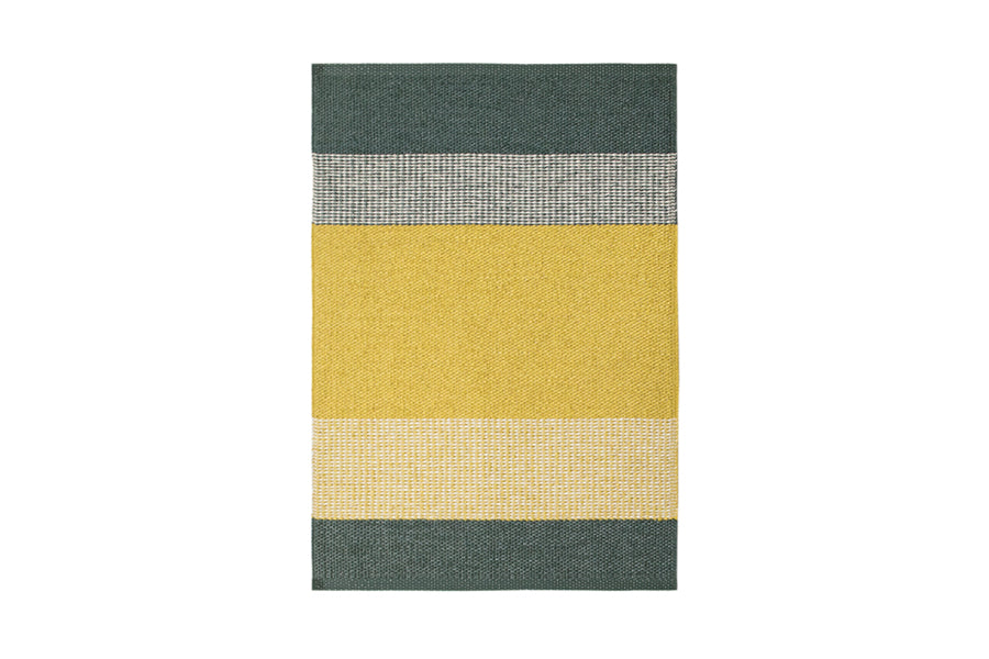 Seasons Woven Plastic Rug by Brita, showing back view of seasons woven plastic rug in sunny seasons woven rug.