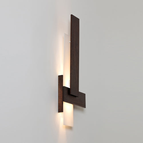 Sedo LED Sconce by Cerno, showing angle view of sedo led sconces in dark stained walnut wood.