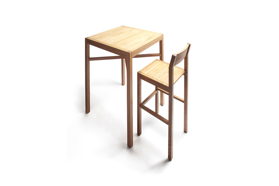 Seminar KVBP High Table by Nikari, showing angle view of seminar kvbp high table in oak/24" square x 41" high.