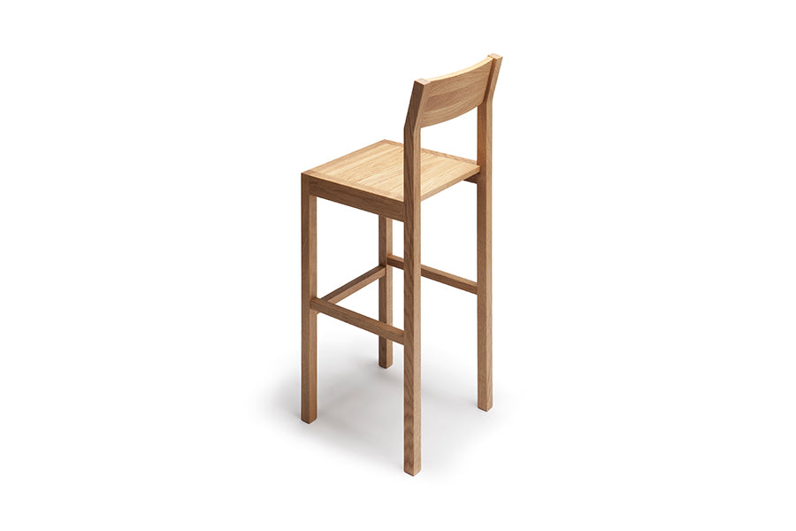 Seminar KVBT1 Bar Chair by Nikari, showing back view of seminar kvbt1 bar chair in oak.