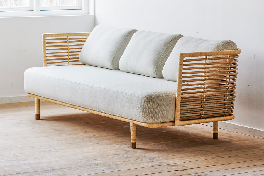 Sense Indoor 3-seater Sofa by Cane-Line, showing sense indoor 3-seater sofa in live shot.
