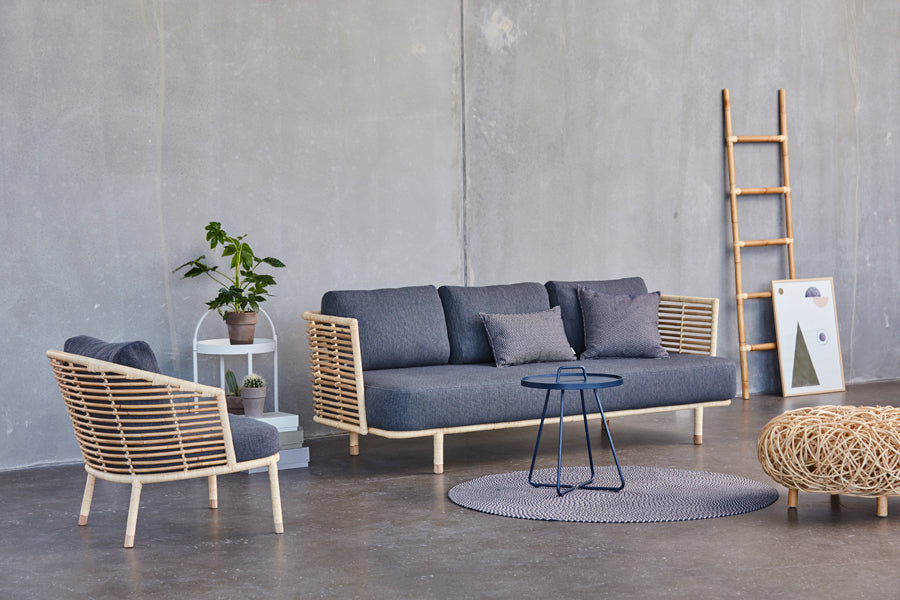 Sense Indoor 3-seater Sofa by Cane-Line, showing sense indoor 3-seater sofa in live shot.